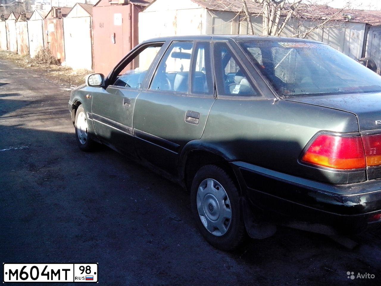 Фото автомобиля DAEWOO ESPERO, 1997 — госномер М604МТ98. Цвет: Темно-зеленый