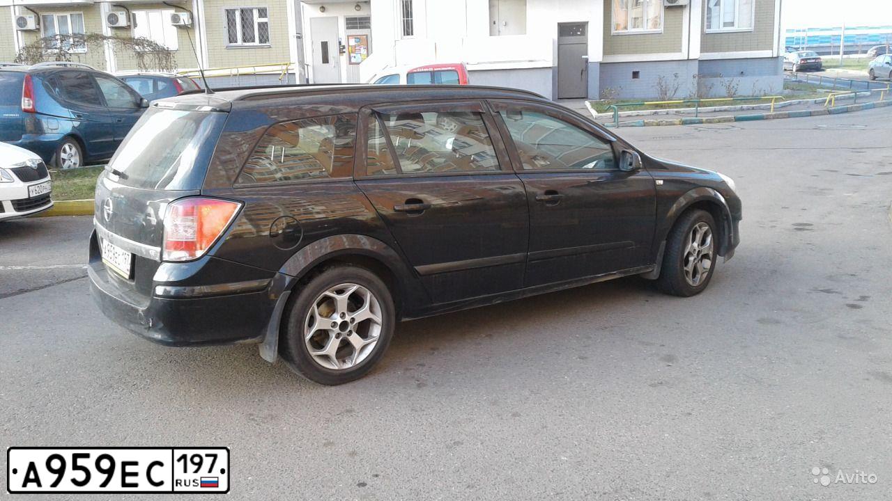 Фото автомобиля OPEL ASTRA, 2008 — госномер Е574АА550. Цвет: ЧЕРНЫЙ