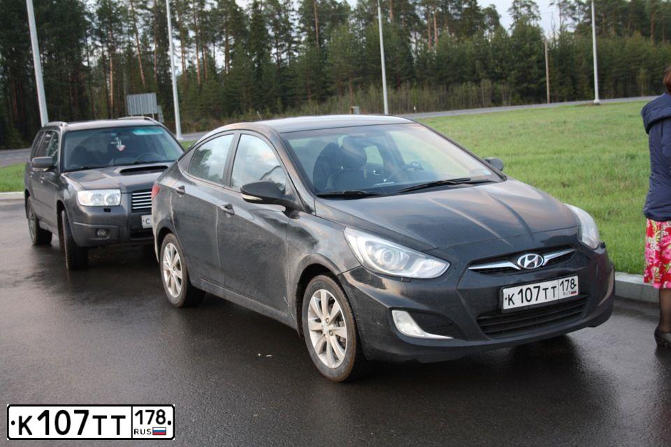 Фото автомобиля HYUNDAI SOLARIS, 2011 — госномер К107ТТ178. Цвет: ЧЕРНЫЙ