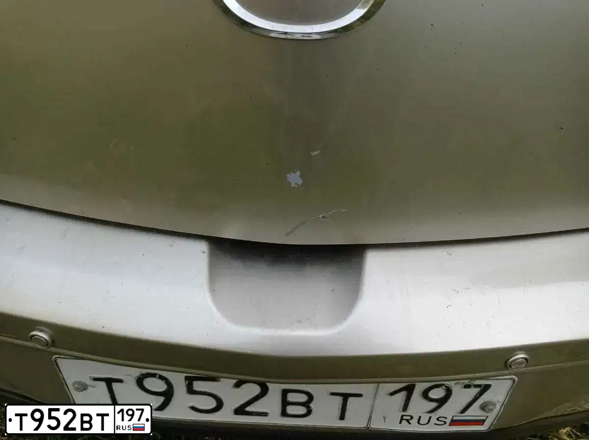 Фото автомобиля MAZDA 3, 2007 — госномер Т952ВТ197. Цвет: Серый