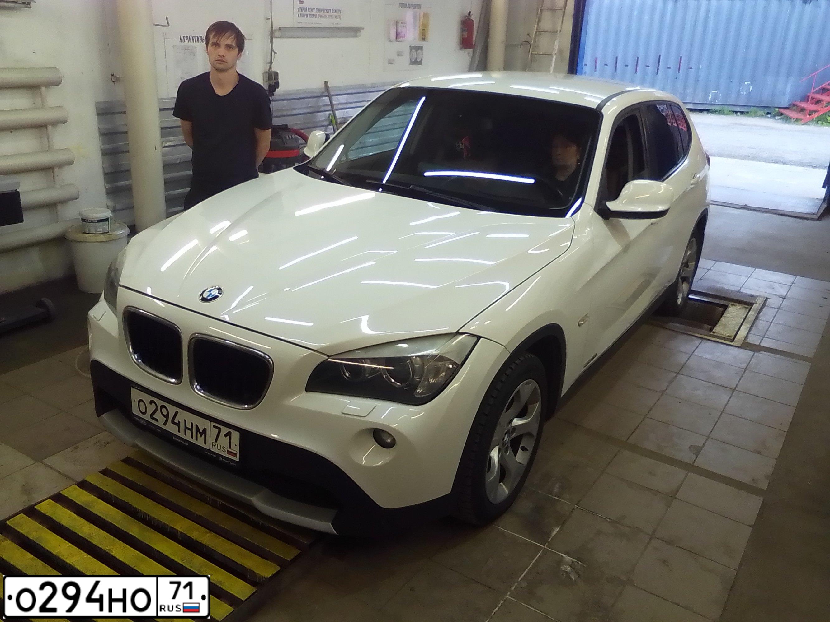 Фото автомобиля BMW X1, 2011 — госномер О294НО71. Цвет: Белый