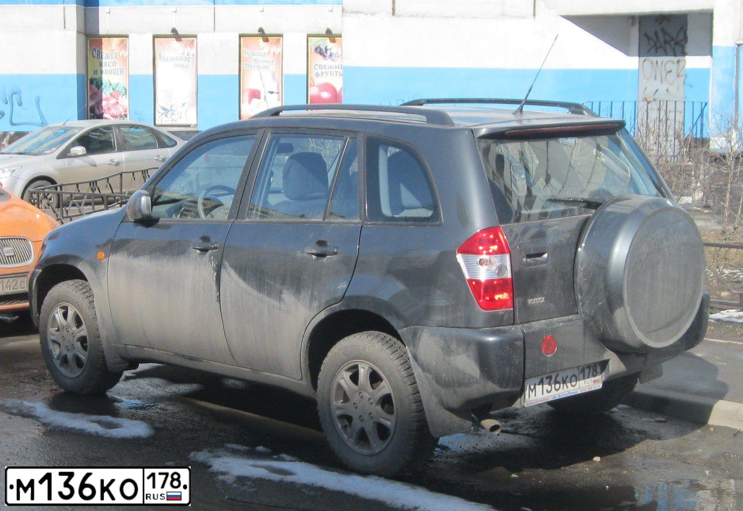 Фото автомобиля CHEVROLET AVEO, 2007 — госномер М136КО178. Цвет: Красный