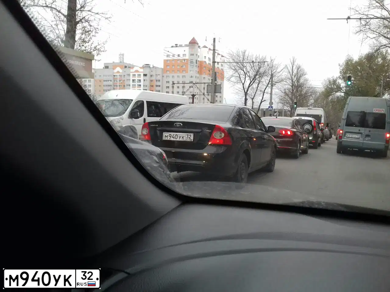Фото автомобиля FORD FOCUS, 2009 — госномер М940УК32. Цвет: ЧЕРНЫЙ