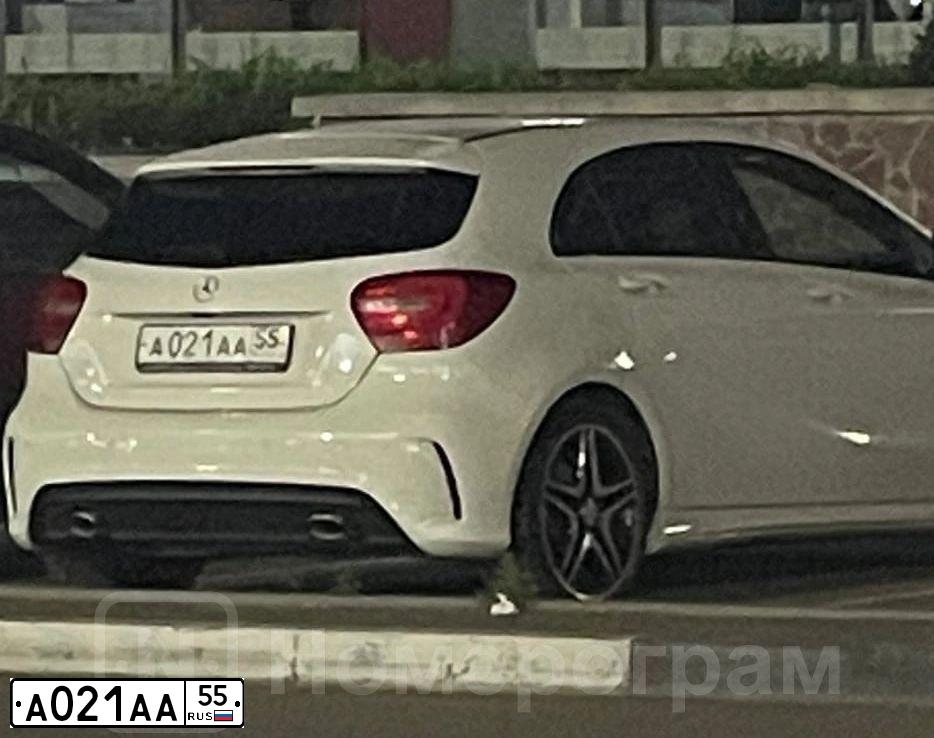 Фото автомобиля SUBARU IMPREZA, 2009 — госномер А021АА55. Цвет: Серебристый