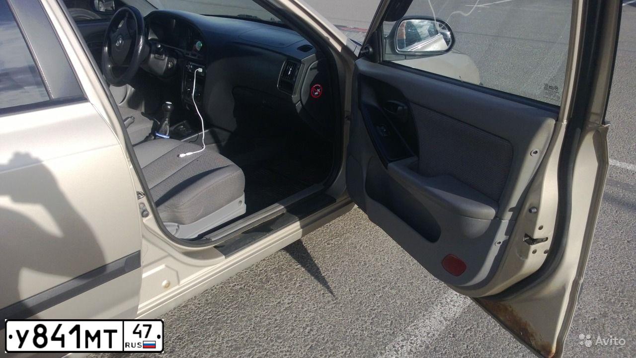 Фото автомобиля HYUNDAI ELANTRA, 2004 — госномер У841МТ47. Цвет: БЕЖЕВЫЙ
