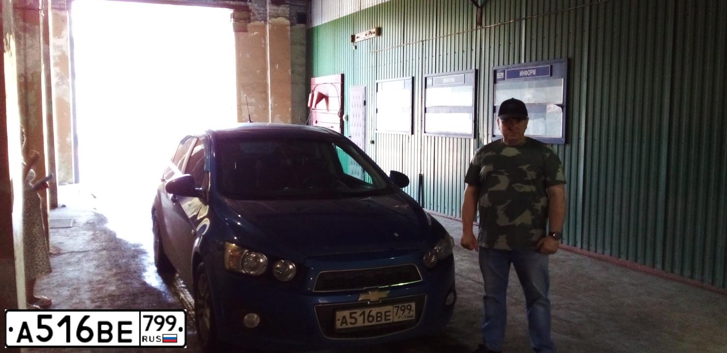 Фото автомобиля CHEVROLET AVEO, 2015 — госномер Х877ОА67. Цвет: СИНИЙ МЕТАЛЛИК