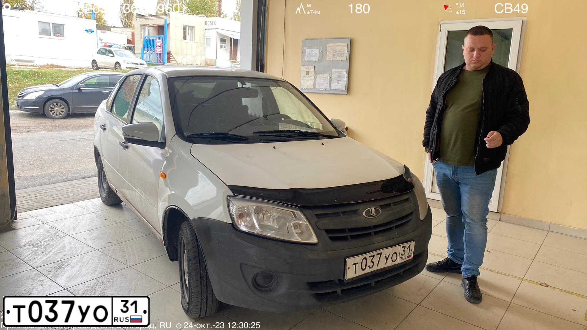 Фото автомобиля LADA 2190 GRANTA, 2016 — госномер Т210РС178. Цвет: Белый