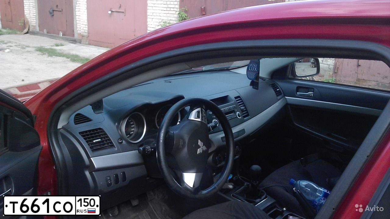 Фото автомобиля MITSUBISHI LANCER, 2008 — госномер М600ОЕ82. Цвет: Красный