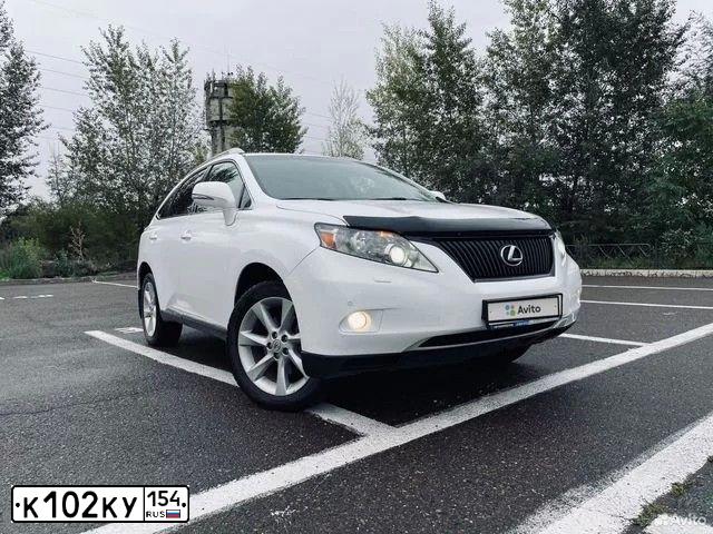 Фото автомобиля LEXUS RX, 2009 — госномер О147ТТ154. Цвет: ПЕРЛАМУТРОВО-БЕЛЫЙ