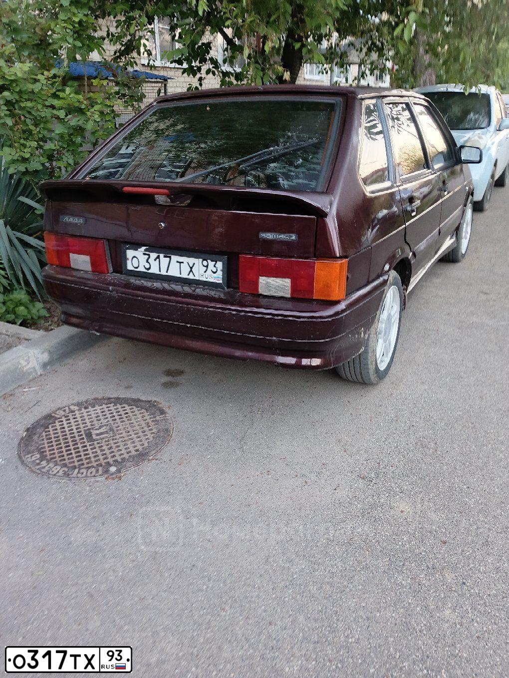Фото автомобиля LADA 2114 SAMARA, 2010 — госномер О317ТХ93. Цвет: ТЕМНО-ВИШНЕВЫЙ