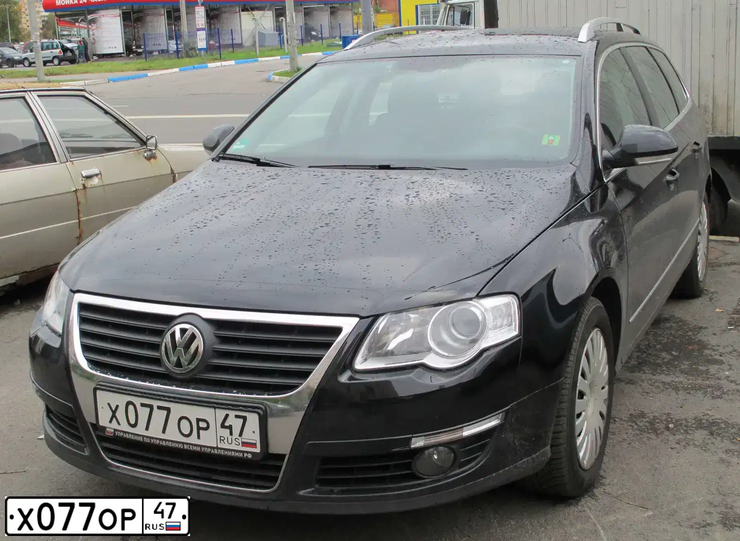 Фото автомобиля VOLKSWAGEN PASSAT, 2010 — госномер Х077ОР47. Цвет: ЧЕРНЫЙ