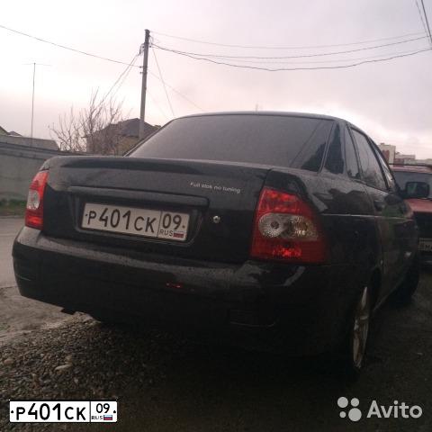 Фото автомобиля LADA 2170 PRIORA, 2009 — госномер Р401СК09. Цвет: Темно-зеленый