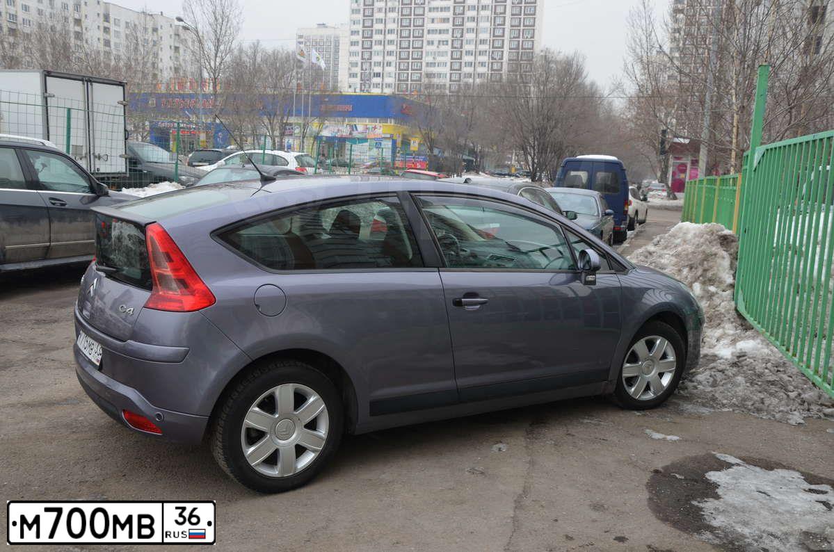 Фото автомобиля TOYOTA CAMRY, 2018 — госномер М700МВ36. Цвет: БЕЛЫЙ ПЕРЛАМУТР