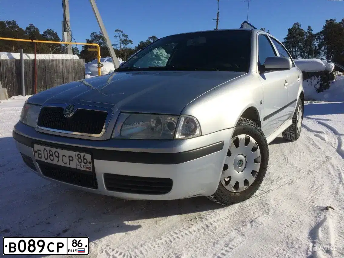 Фото автомобиля SKODA OCTAVIA, 2008 — госномер Т147СО55. Цвет: СЕРЕБРИСТЫЙ