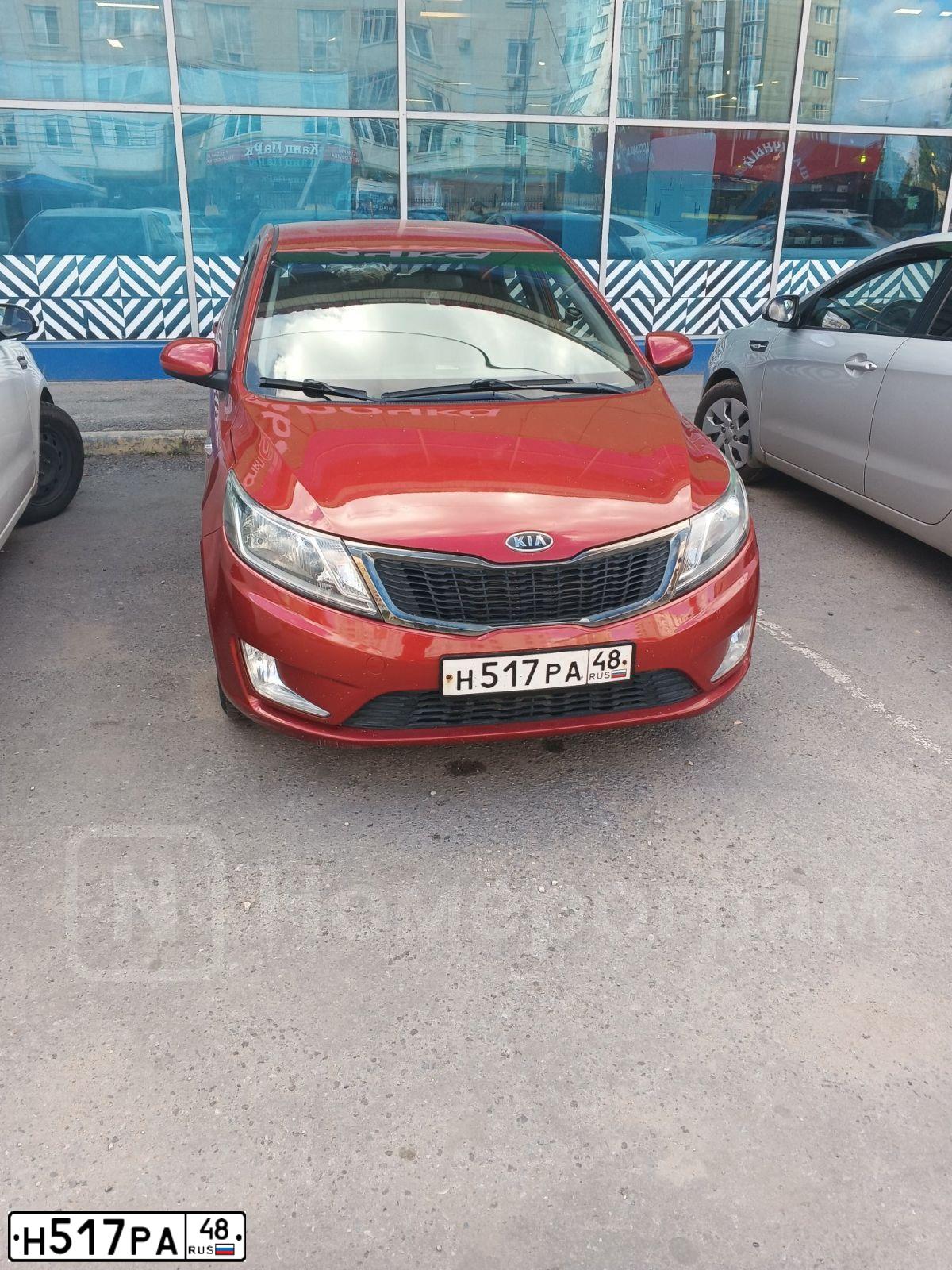 Фото автомобиля KIA RIO, 2012 — госномер К551НК136. Цвет: Красный