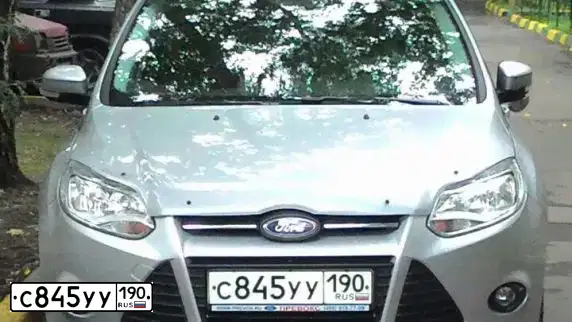 Фото автомобиля FORD FOCUS, 2012 — госномер Е409ОО797. Цвет: СЕРЕБРИСТЫЙ