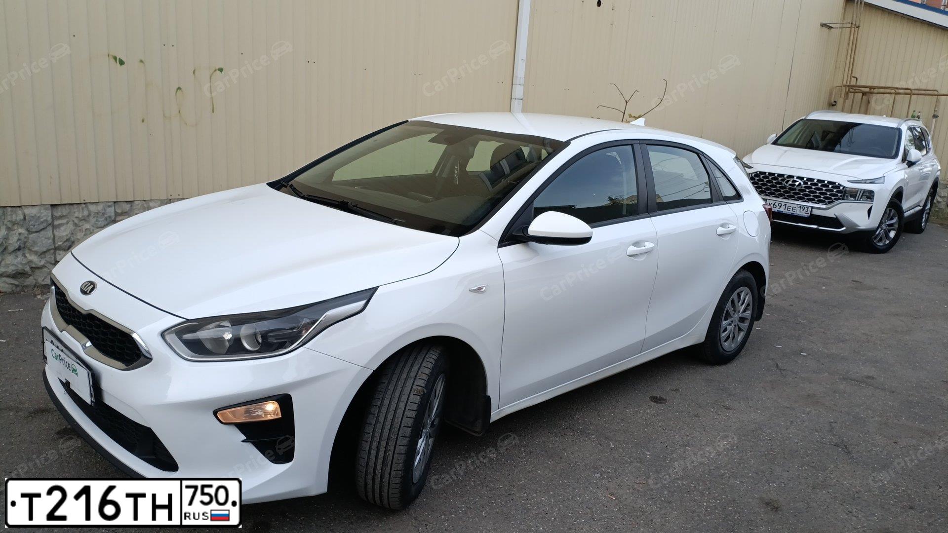 Фото автомобиля KIA CEE'D, 2018 — госномер Т216ТН750. Цвет: БЕЛЫЙ ЖЕЛТЫЙ СЕРЫЙ