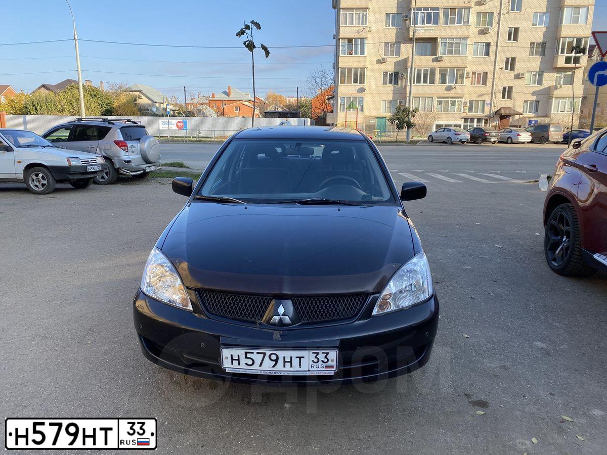 Фото автомобиля MITSUBISHI LANCER, 2006 — госномер А186АВ180. Цвет: ЧЕРНЫЙ