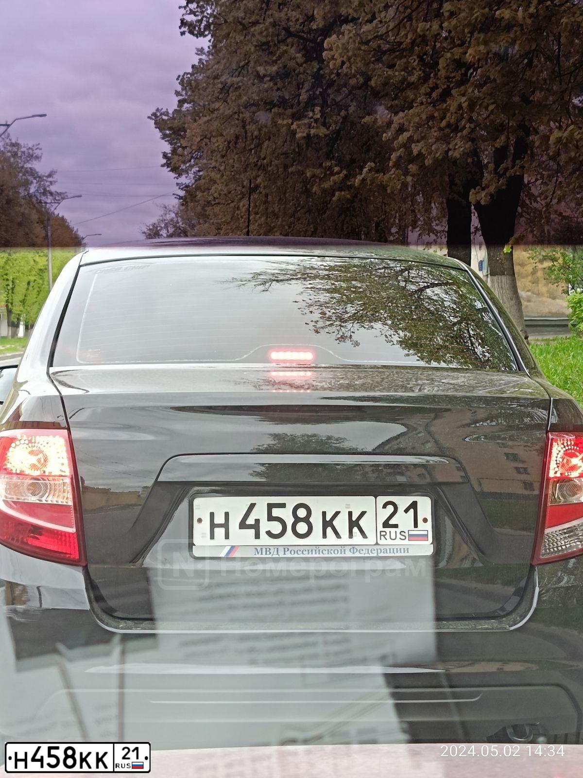 Фото автомобиля VAZ LADA GRANTA 219040, 2022 — госномер Н458КК21. Цвет: ЧЕРНЫЙ