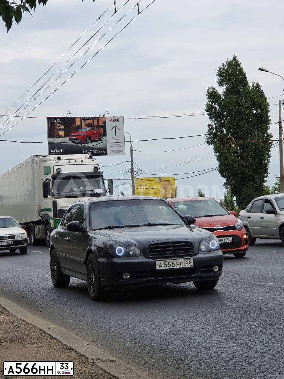 Фото автомобиля TAGAZ SONATA, 2006 — госномер А566НН33. Цвет: ЧЕРНЫЙ