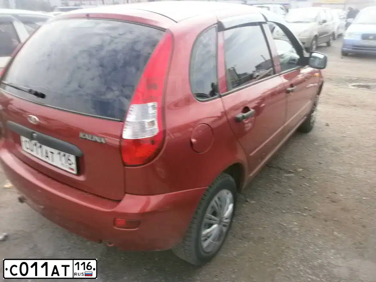 Фото автомобиля LADA 1119 KALINA, 2012 — госномер С011АТ116. Цвет: СЕРЕБРИСТО-КРАСНЫЙ
