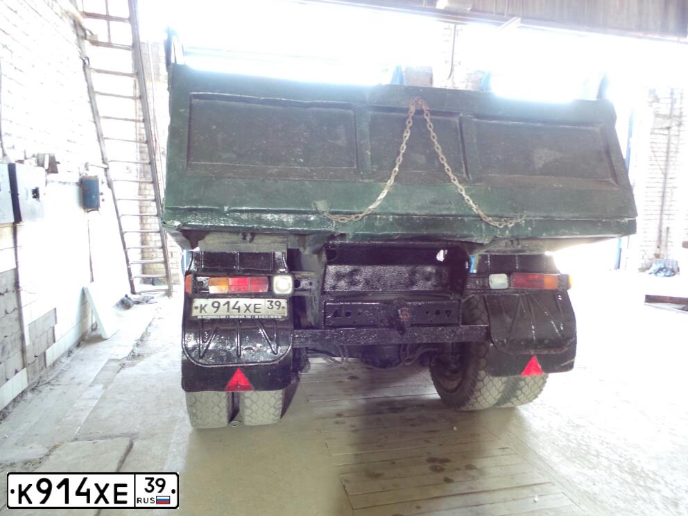 Фото автомобиля KAMAZ 55111 /6X4/, 1989 — госномер К914ХЕ39. Цвет: Оранжевый