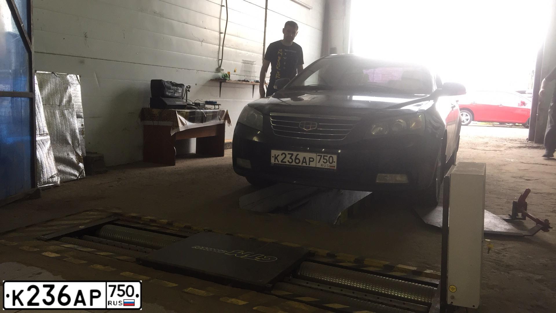 Фото автомобиля GEELY EMGRAND (FE-1), 2014 — госномер О666ОС790. Цвет: ЧЕРНЫЙ