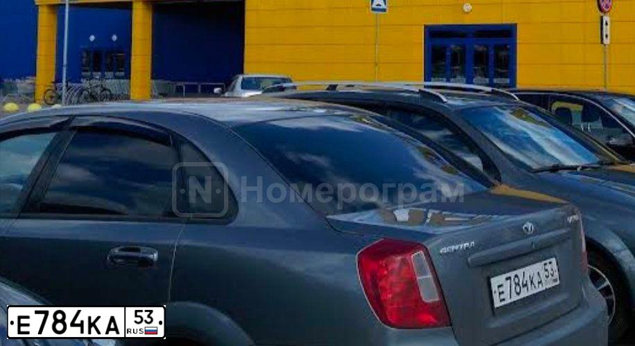 Фото автомобиля DAEWOO GENTRA, 2013 — госномер Е784КА53. Цвет: ТЕМНО-СЕРЫЙ