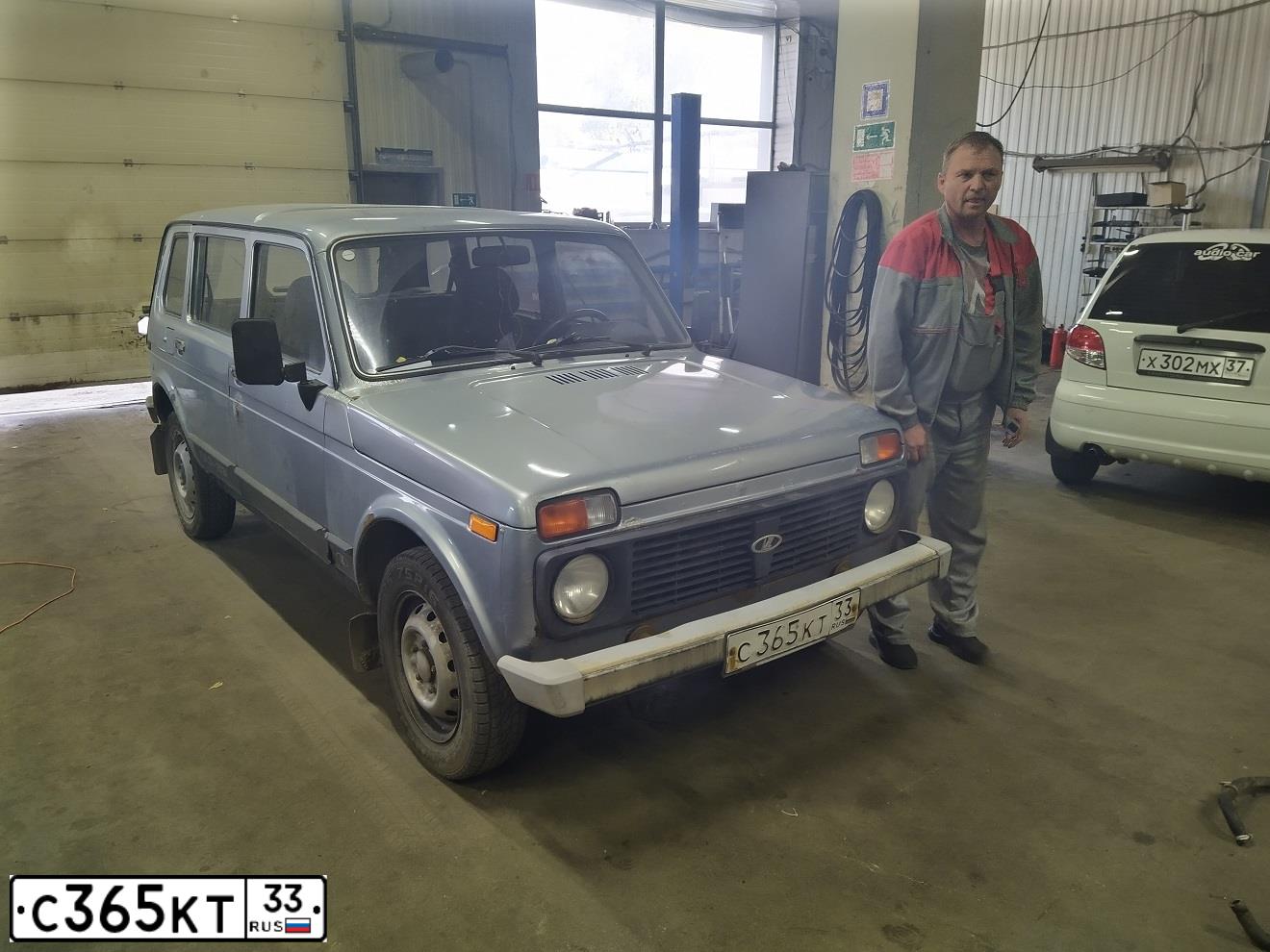 Фото автомобиля LADA 2131 NIVA, 2009 — госномер Н820ВС977. Цвет: СЕРЕБРИСТО-ГОЛУБОЙ