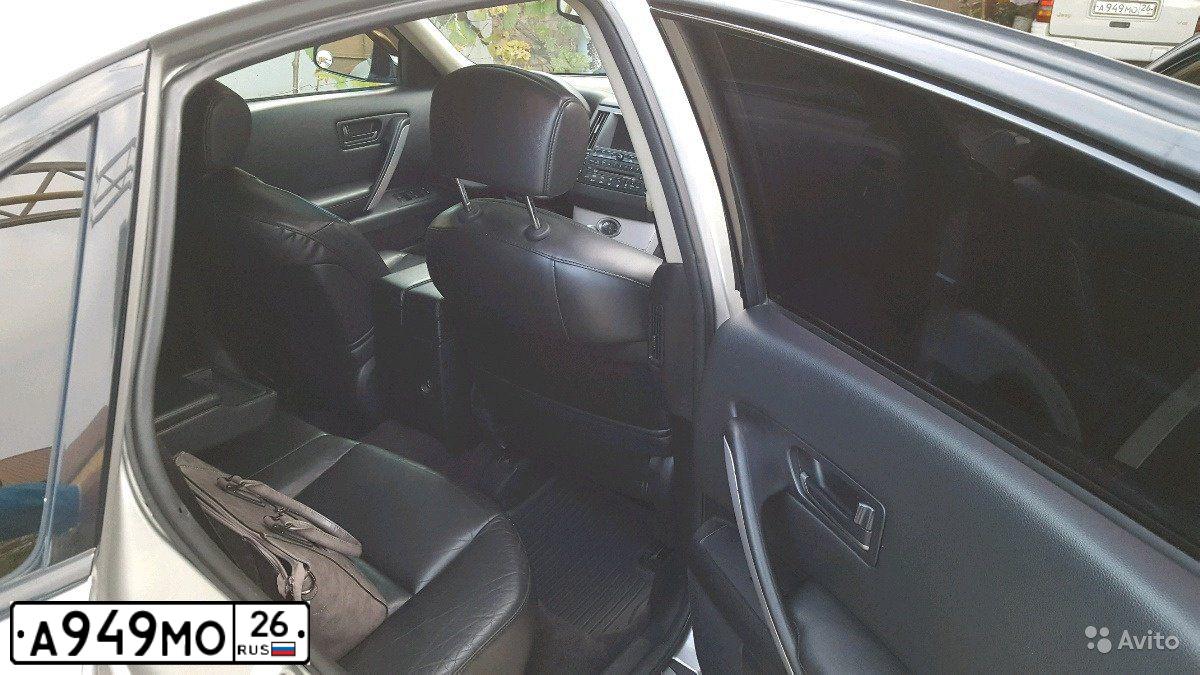 Фото автомобиля JEEP GRAND CHEROKEE, 1997 — госномер А949МО26. Цвет: БЕЛЫЙ