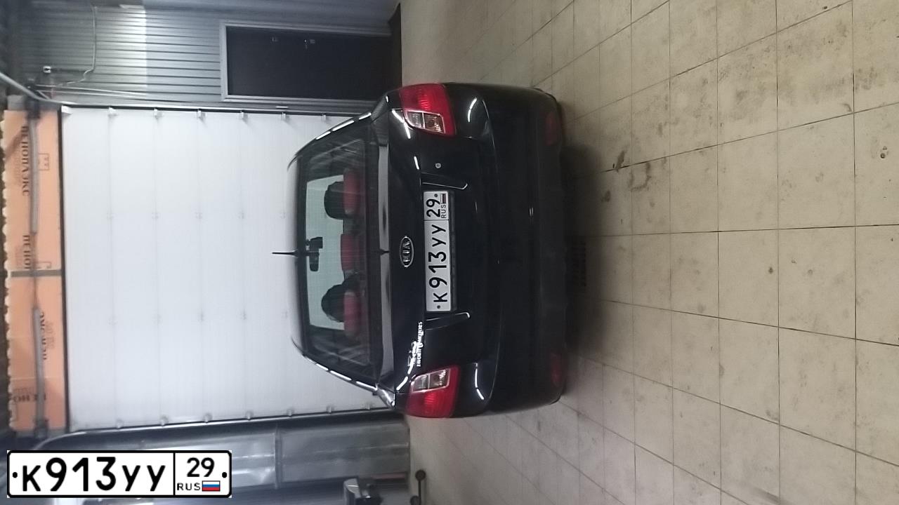 Фото автомобиля KIA RIO, 2010 — госномер К913УУ29. Цвет: ЧЕРНЫЙ