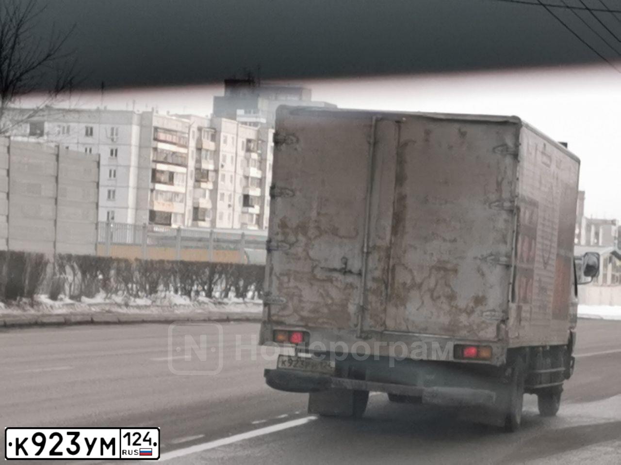 Фото автомобиля BMW X7, 2019 — госномер К923УМ124. Цвет: ЧЕРНЫЙ
