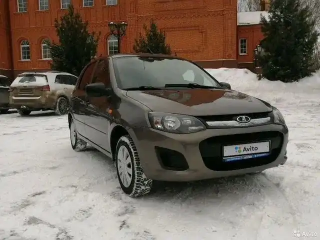 Фото автомобиля LADA 2192 KALINA, 2015 — госномер Р409РС196. Цвет: Коричневый
