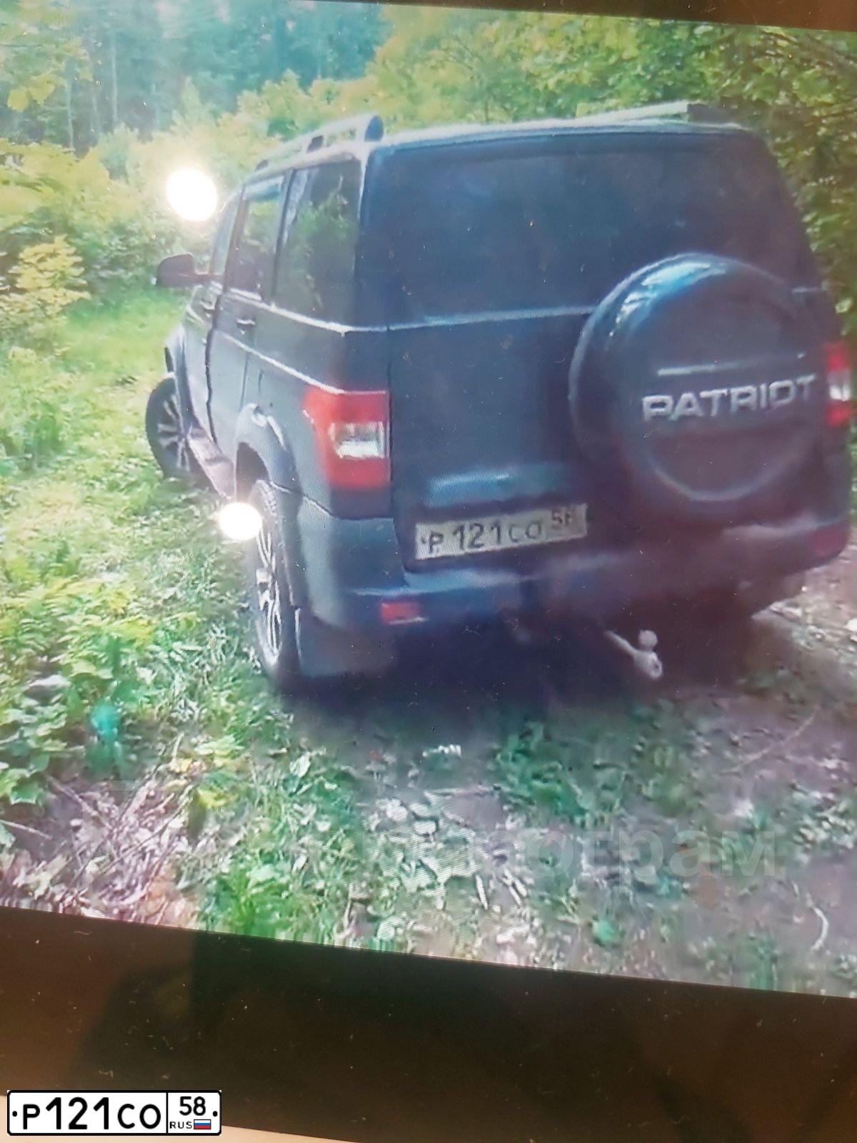 Фото автомобиля UAZ 3163 PATRIOT, 2015 — госномер Р121СО58. Цвет: ЧЕРНЫЙ МЕТАЛЛИК