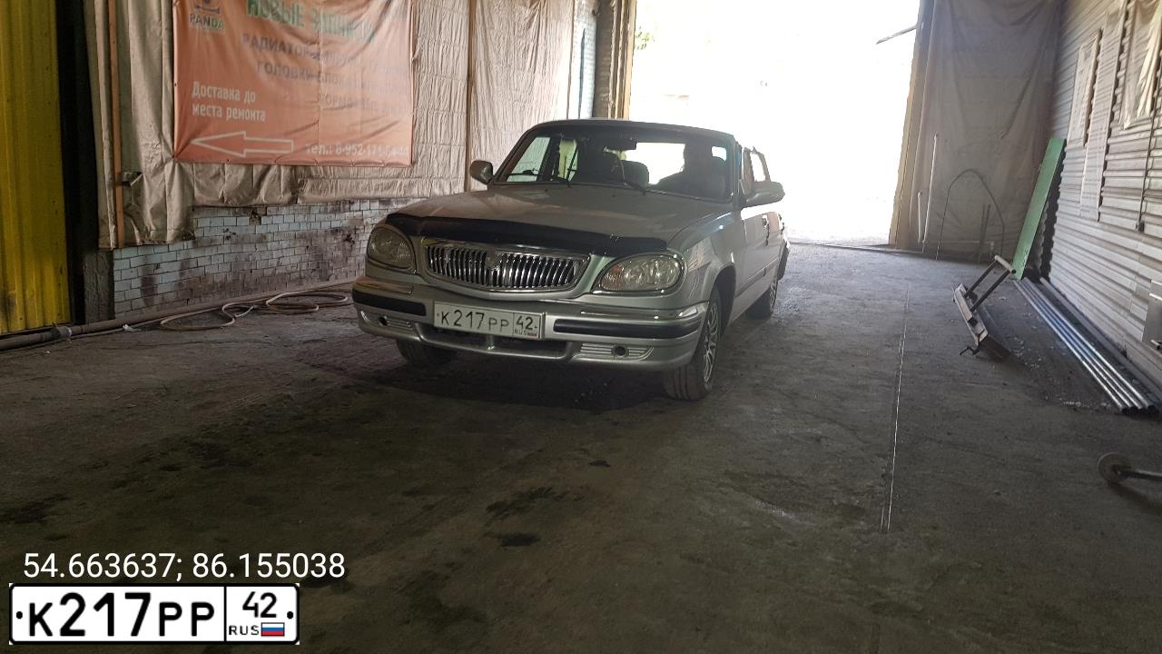Фото автомобиля GAZ 3110 WOLGA, 2006 — госномер К217РР42. Цвет: БУРАН