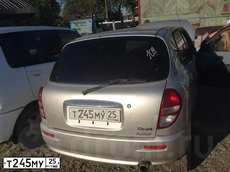 Фото автомобиля TOYOTA DUET, 2000 — госномер Т245МУ25
