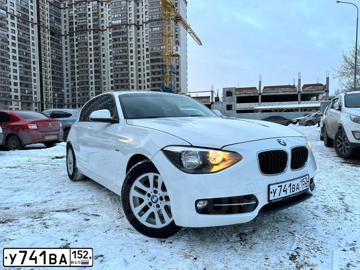 Фото автомобиля BMW SERIE 1, 2012 — госномер Р939ТН152. Цвет: Белый