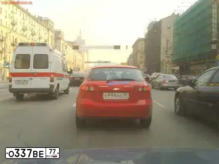 Фото автомобиля MITSUBISHI OUTLANDER, 2009 — госномер О601ОО199. Цвет: ЧЕРНЫЙ