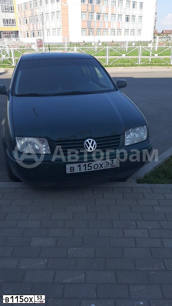 Фото автомобиля VOLKSWAGEN BORA, 1999 — госномер В115ОХ53. Цвет: ЗЕЛЕНЫЙ