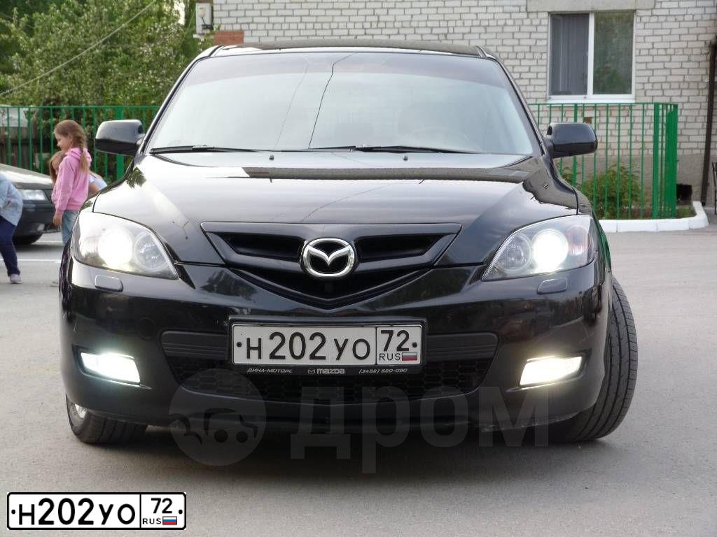 Фото автомобиля MAZDA 3, 2008 — госномер К111ОА72. Цвет: ЧЕРНЫЙ
