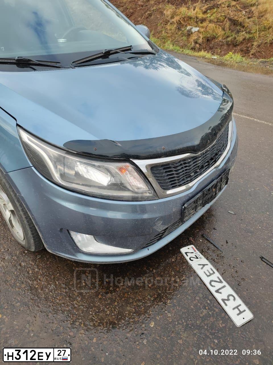 Фото автомобиля KIA RIO, 2013 — госномер О028НТ27. Цвет: ГОЛУБОЙ