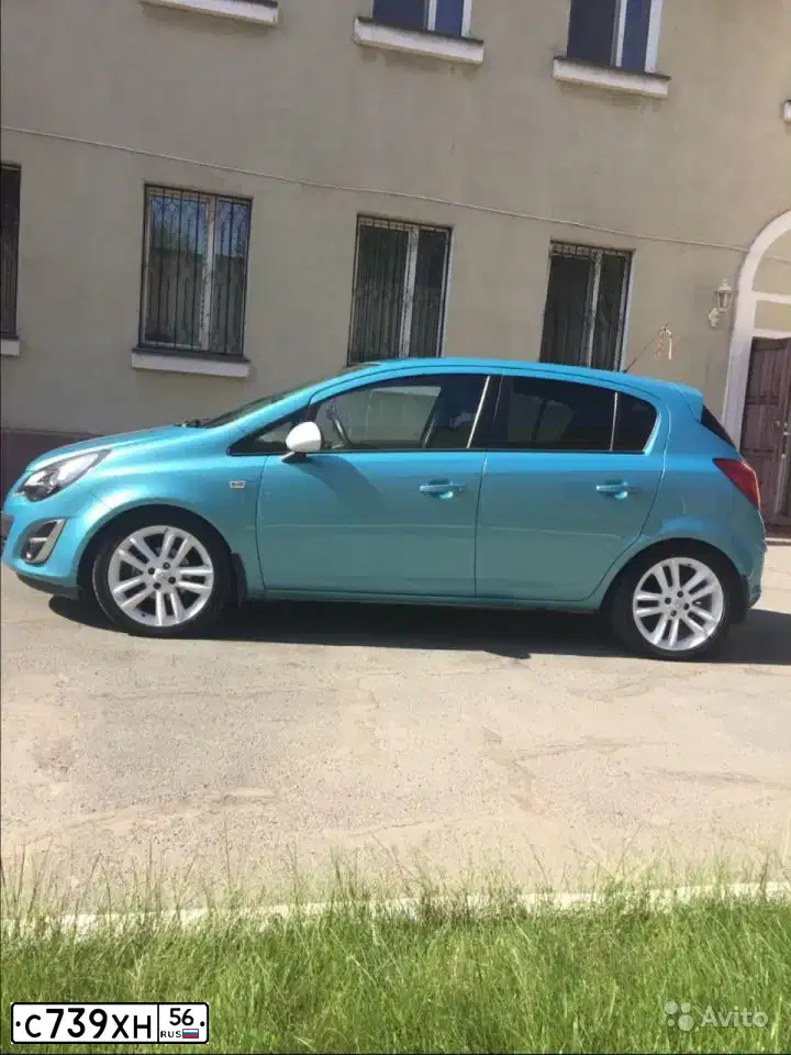 Фото автомобиля OPEL CORSA, 2011 — госномер О590ОР31. Цвет: синий