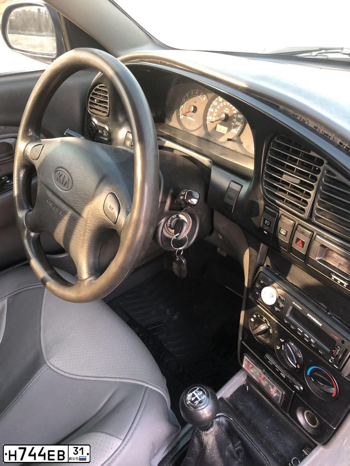 Фото автомобиля KIA SPECTRA, 2008 — госномер Н134УВ82. Цвет: ЧЕРНЫЙ