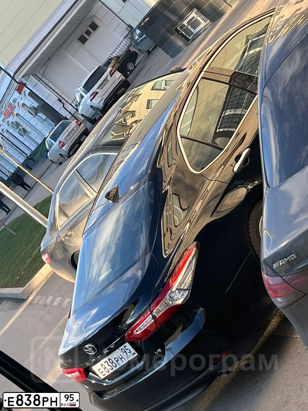 Фото автомобиля TOYOTA CAMRY АSV70L RЕТNКХ, 2020 — госномер О100ВХ797. Цвет: ЧЕРНЫЙ