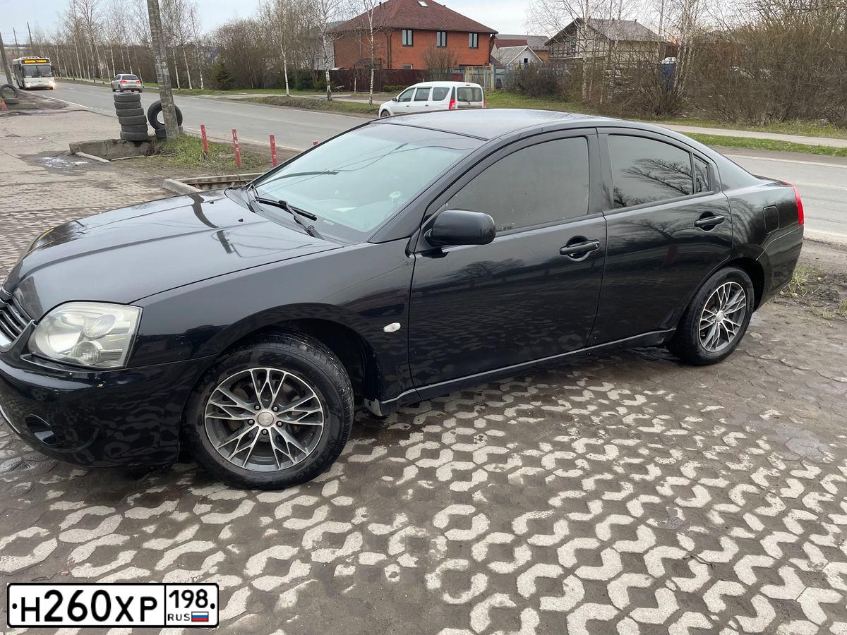 Фото автомобиля MITSUBISHI GALANT, 2007 — госномер Н260ХР198. Цвет: ЧЕРНЫЙ