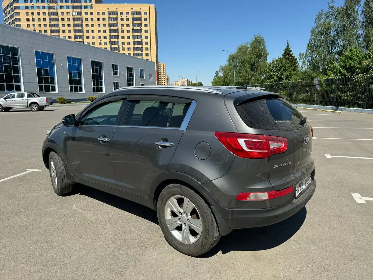 Фото автомобиля KIA SPORTAGE, 2013 — госномер Х986ВС71. Цвет: СЕРЕБРИСТЫЙ