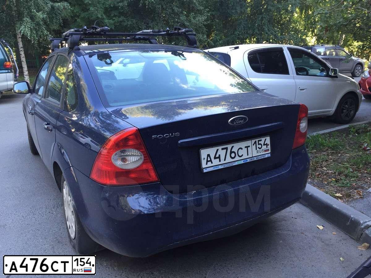 Фото автомобиля FORD FOCUS, 2010 — госномер А476СТ154. Цвет: ТЕМНО СИНИЙ