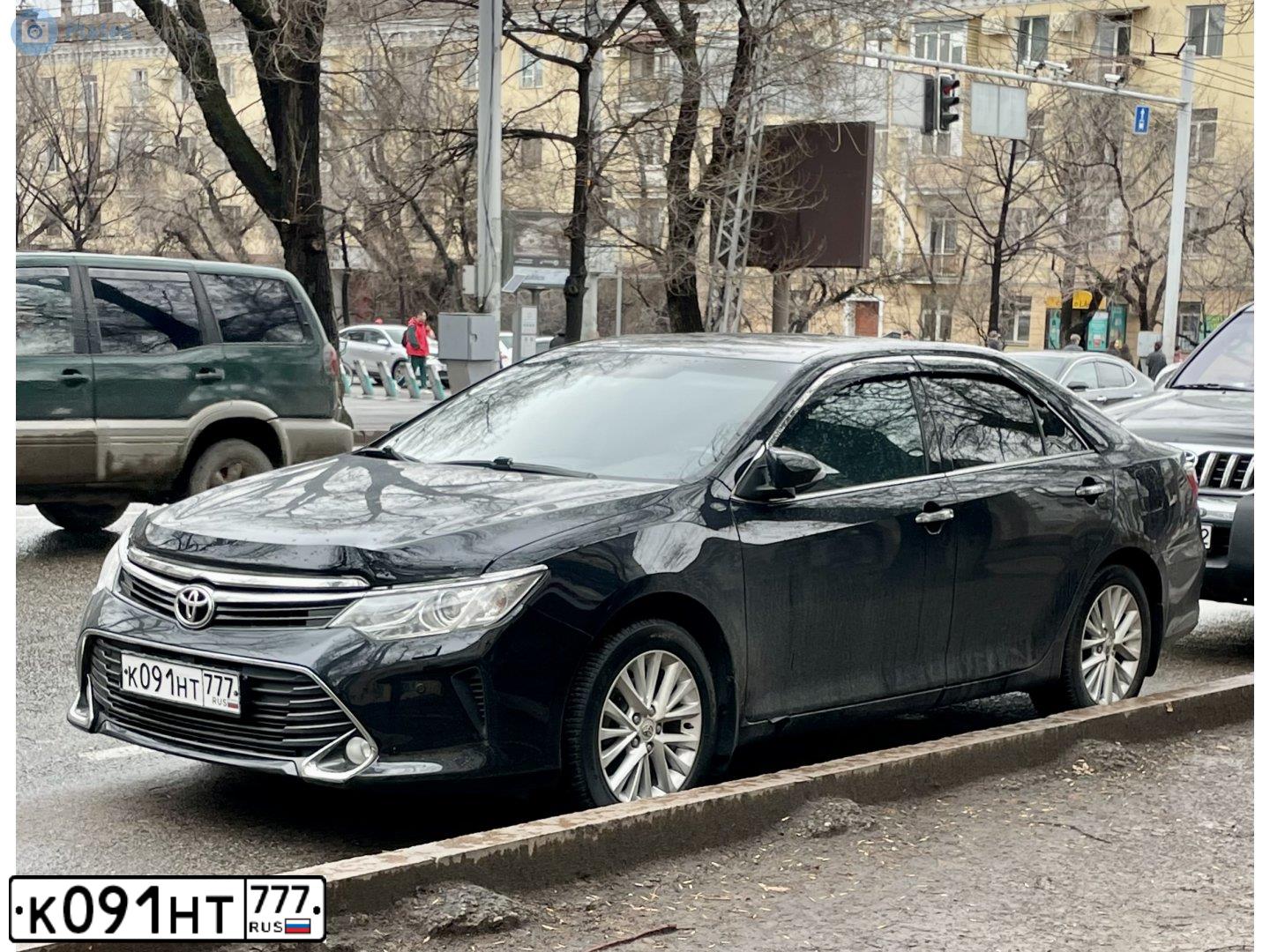 Фото автомобиля TOYOTA CAMRY, 2015 — госномер К091НТ777. Цвет: ЧЕРНЫЙ МЕТАЛЛИК