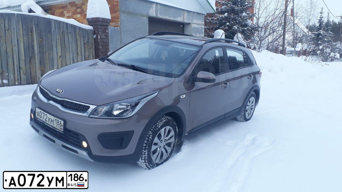Фото автомобиля KIA RIO, 2018 — госномер Х569НК72. Цвет: СВЕТЛО-КОРИЧНЕВЫЙ