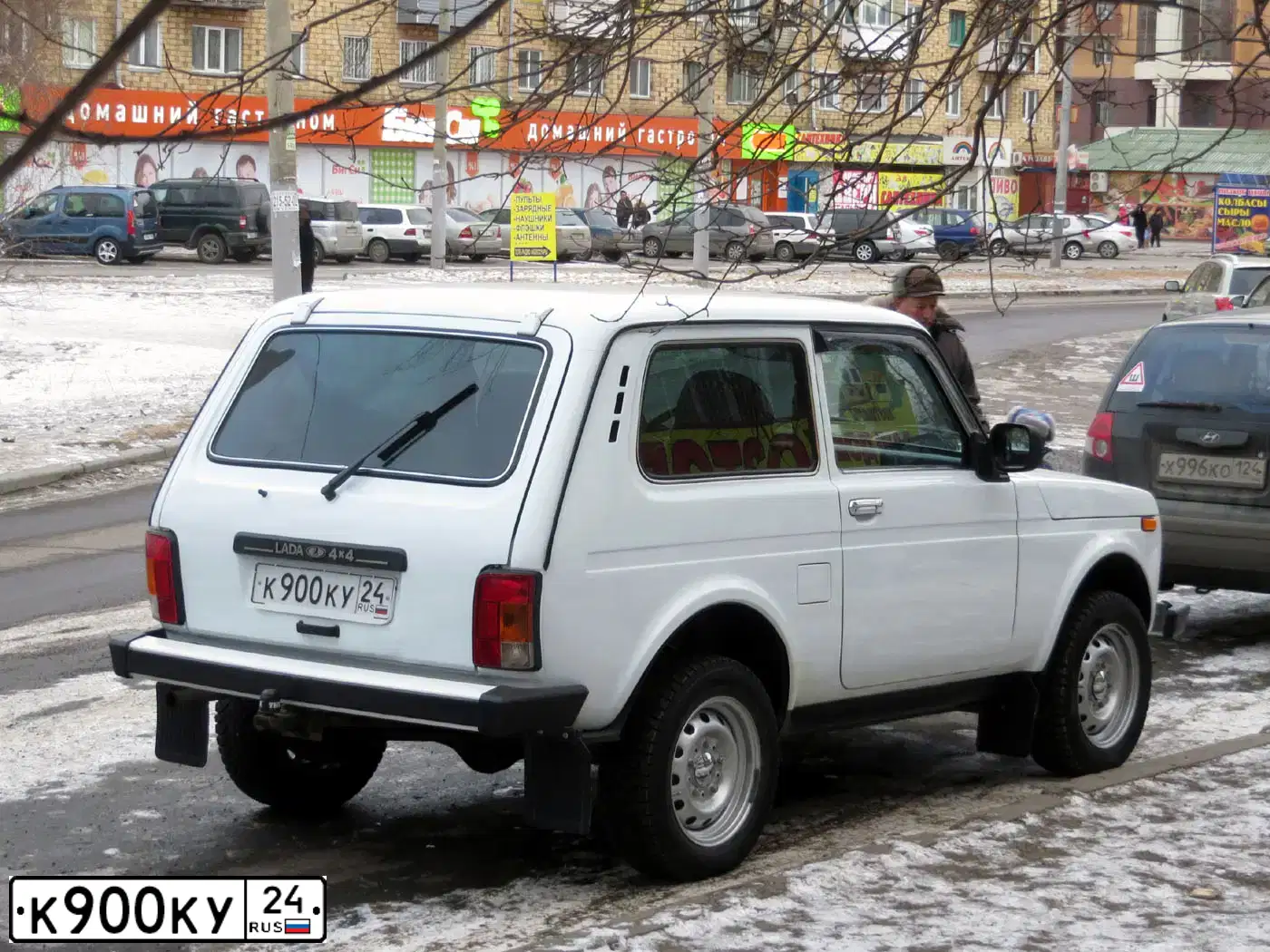 Фото автомобиля LADA 2121 NIVA, 2016 — госномер Р150ОН11. Цвет: серебристо-темно-серый